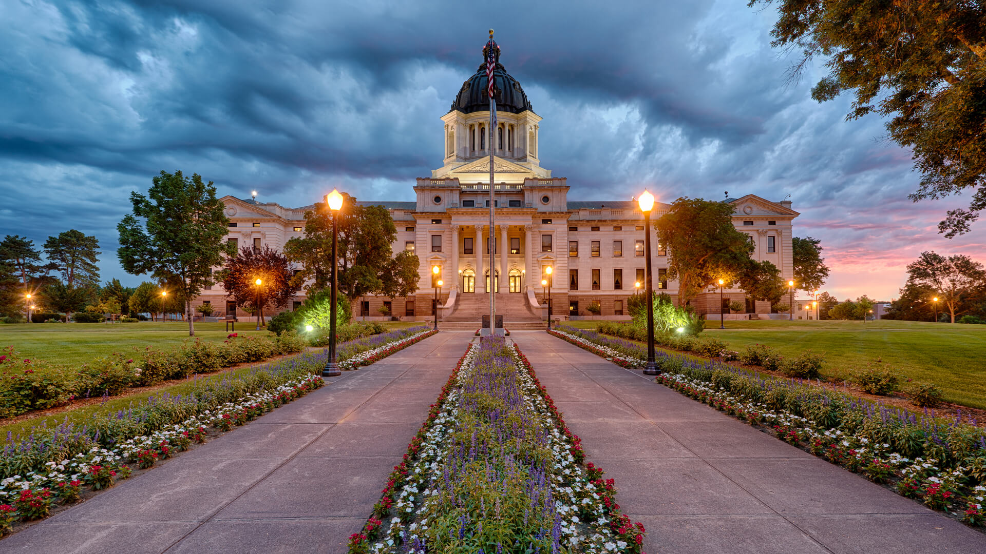 South Dakota State Capitol building in Pierre, South Dakota with a storm in the background