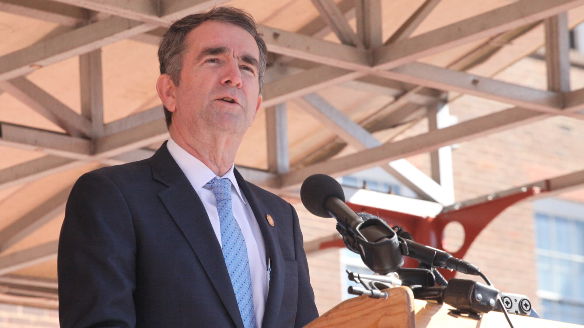 Virginia Governor, Ralph Northam speaking in front of Alexandria City Hall