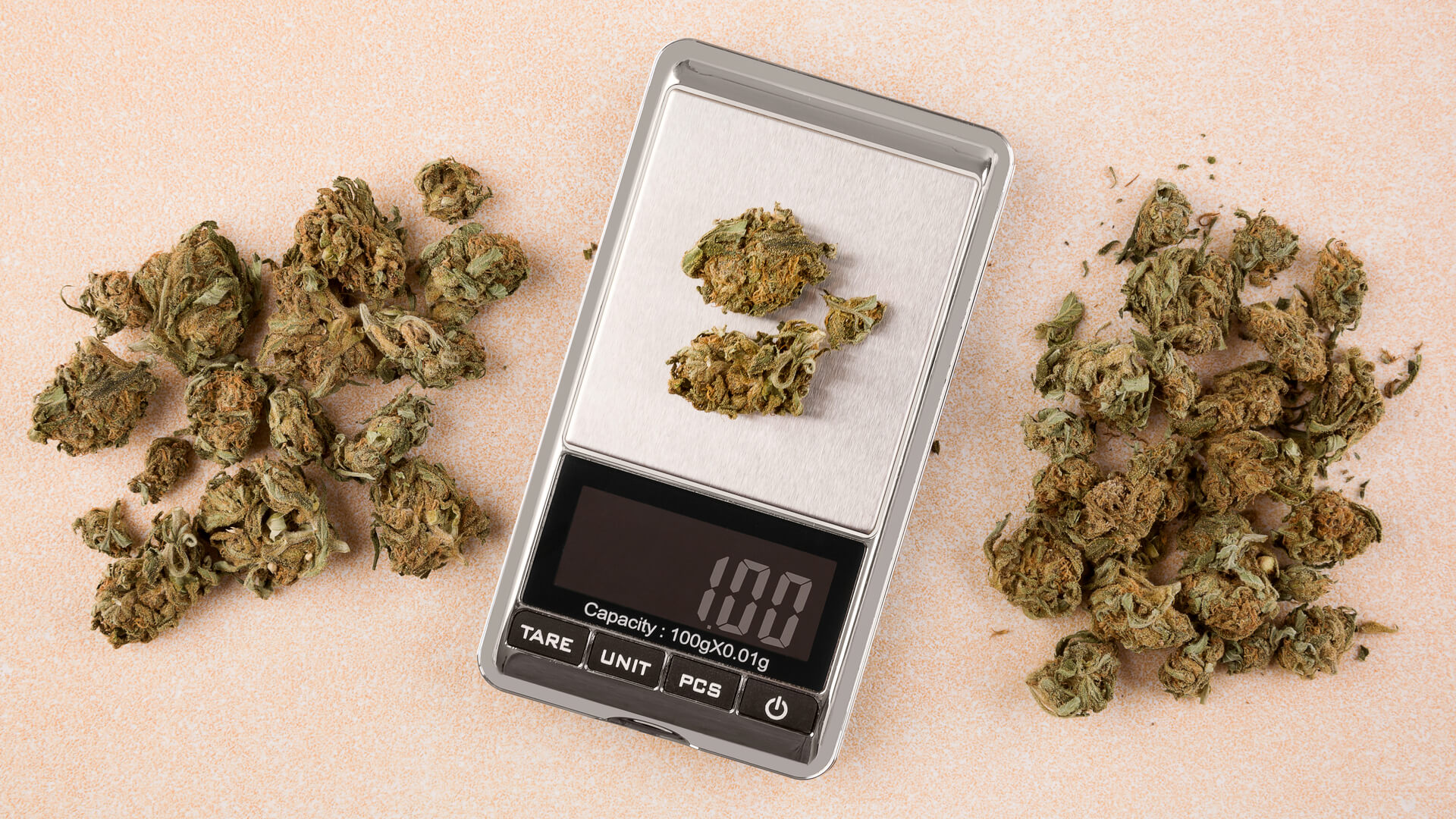 Cannabis buds on a digital scale top view