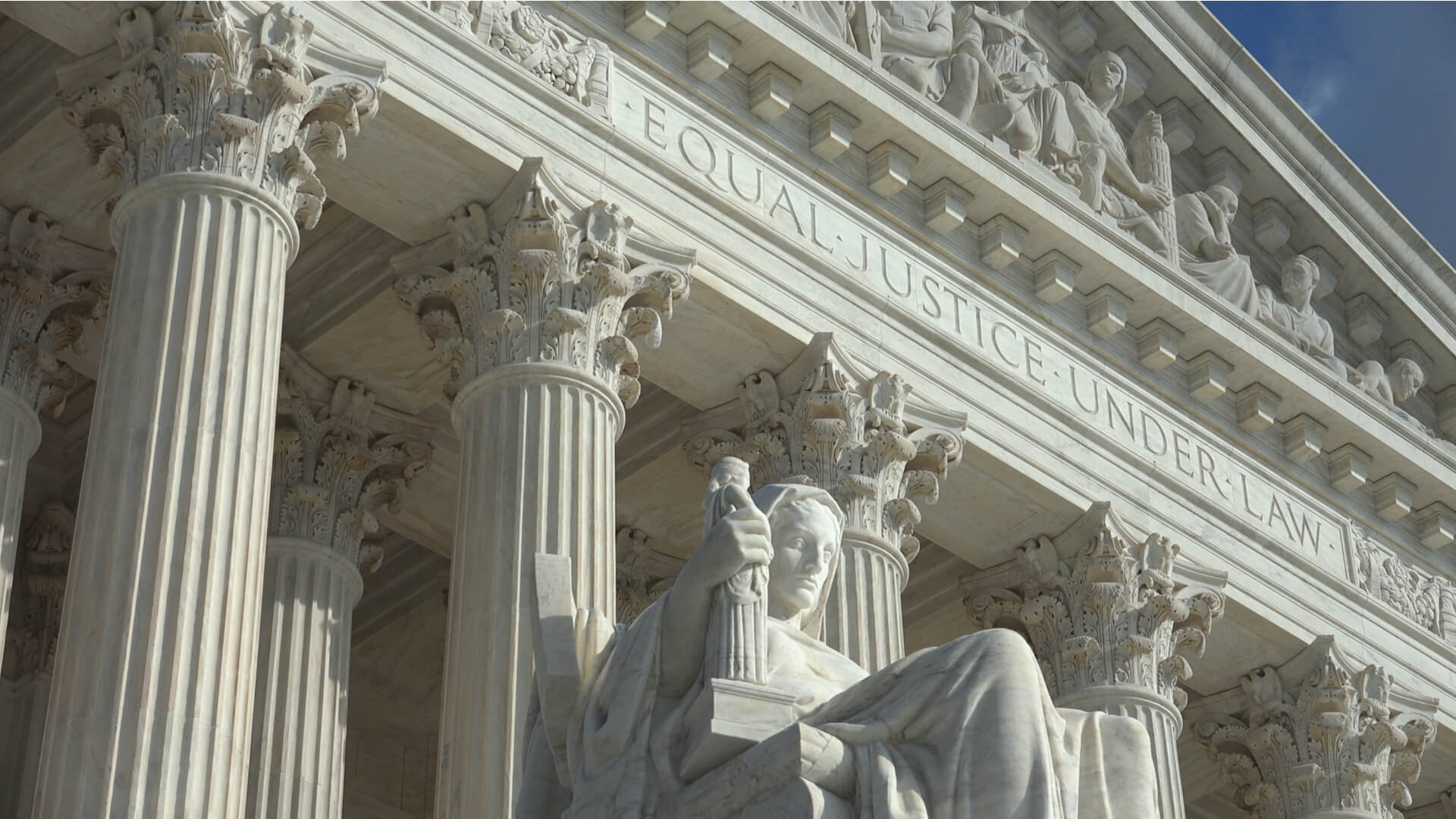 Closeup of the Equal Justice Under Law engraving above entrance to US Supreme Court Building